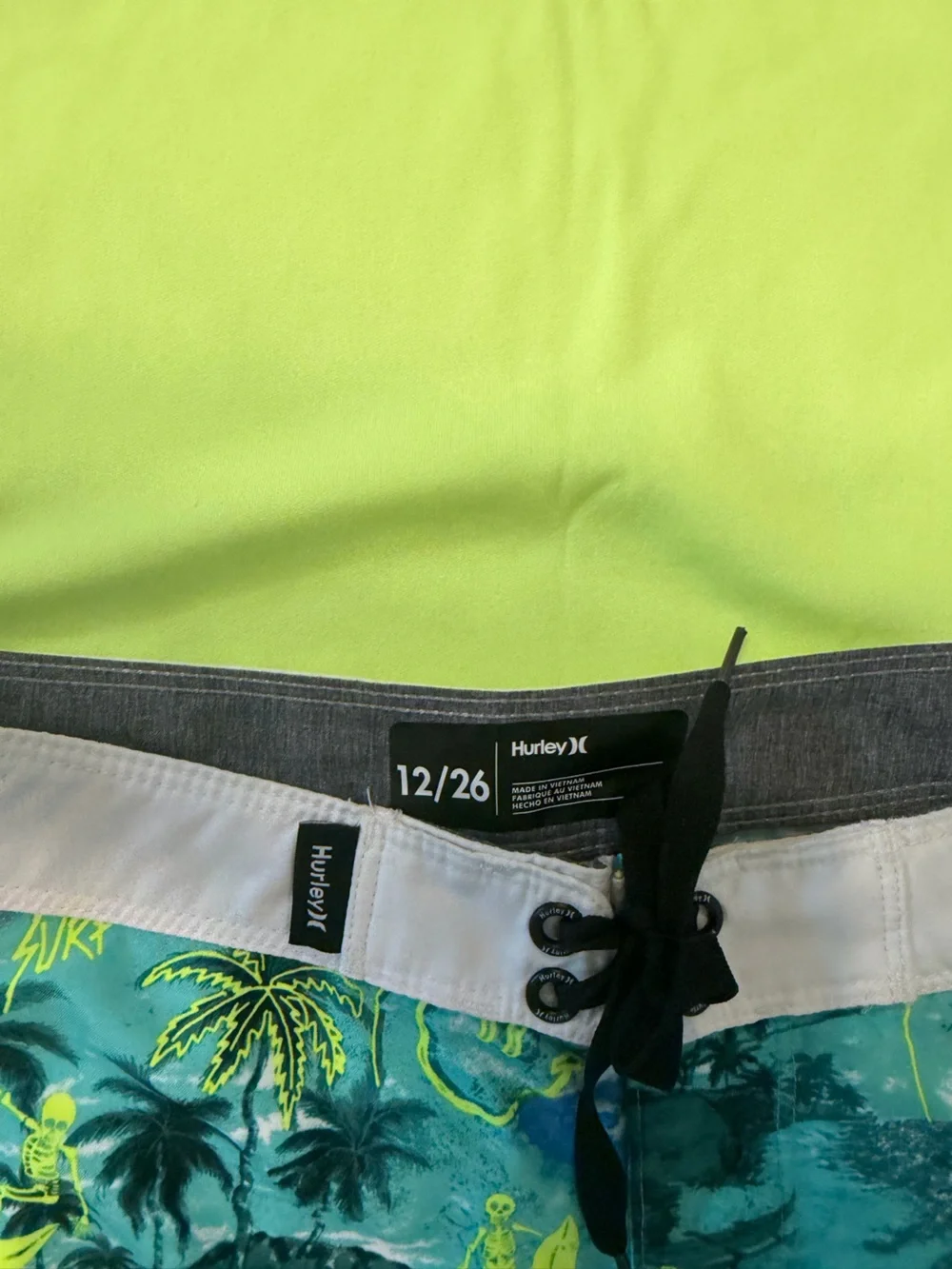 Hurley Teal Palm & Neon Yellow Boy’s Rash guard and swim trunks